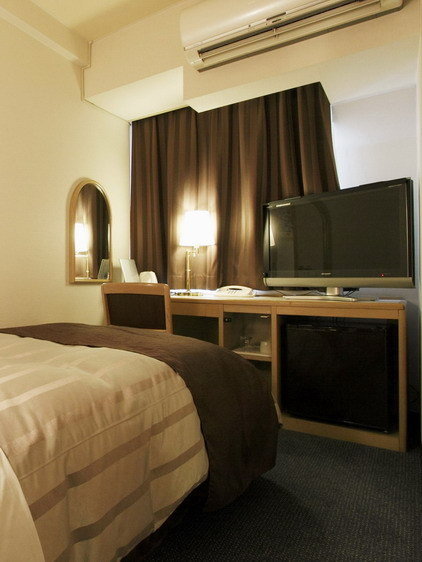 Cama en dormitorio compartido Hotel Ginza Daiei