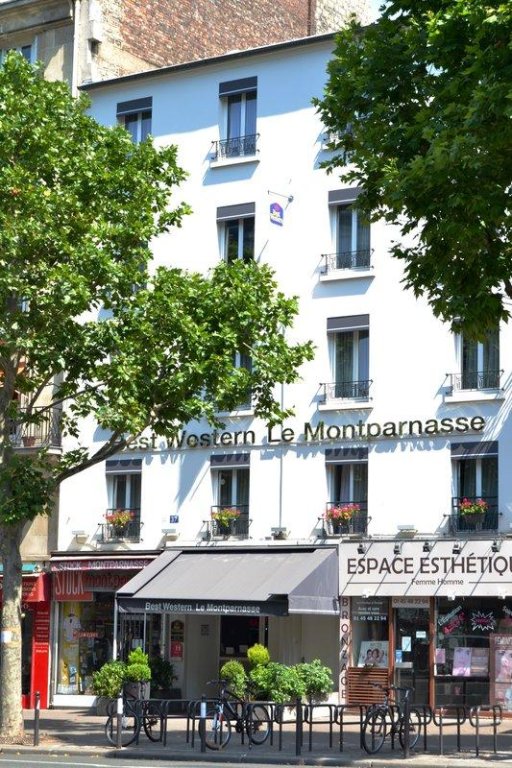 Кровать в общем номере Best Western Hotel Le Montparnasse