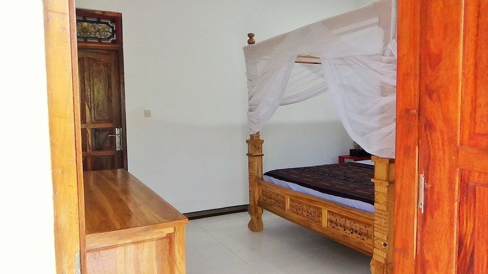 Standard double chambre avec balcon Lotus Guesthouse Sudaji