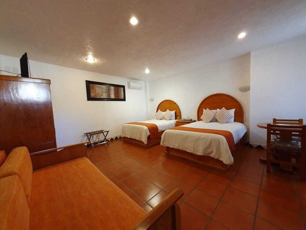 Четырёхместный семейный люкс Hotel Real del Valle Tepoztlán