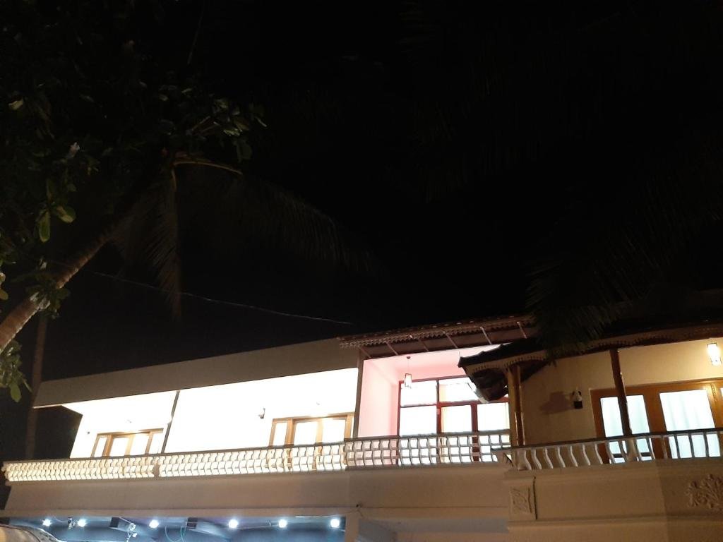 Standard Family room with balcony and with view Cherai Ocean View Home