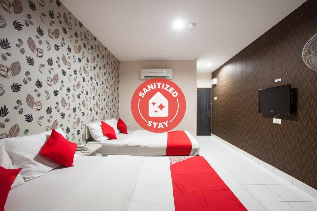 Кровать в общем номере Super OYO 1163 Hotel Pulai