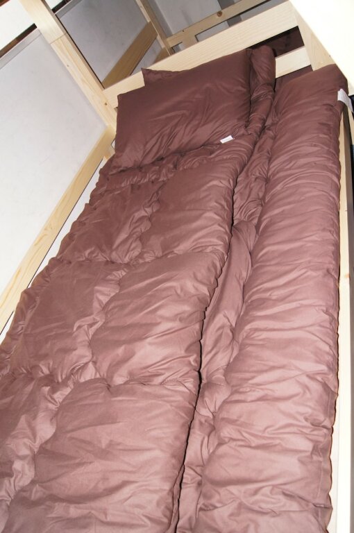 Кровать в общем номере Trip Sound