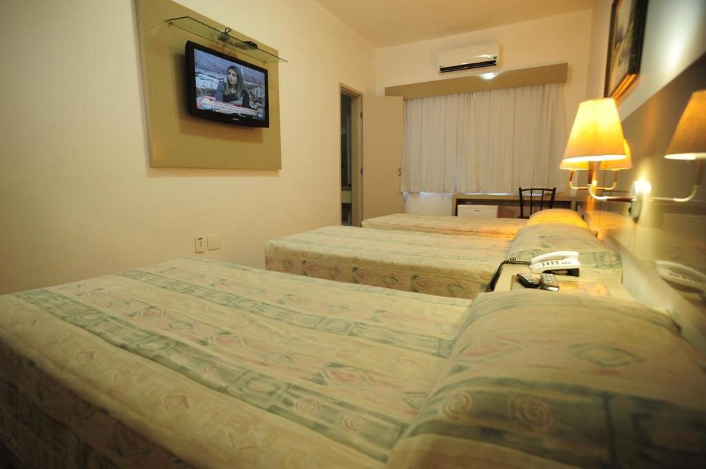Четырёхместный номер Standard Ideal Praia Hotel