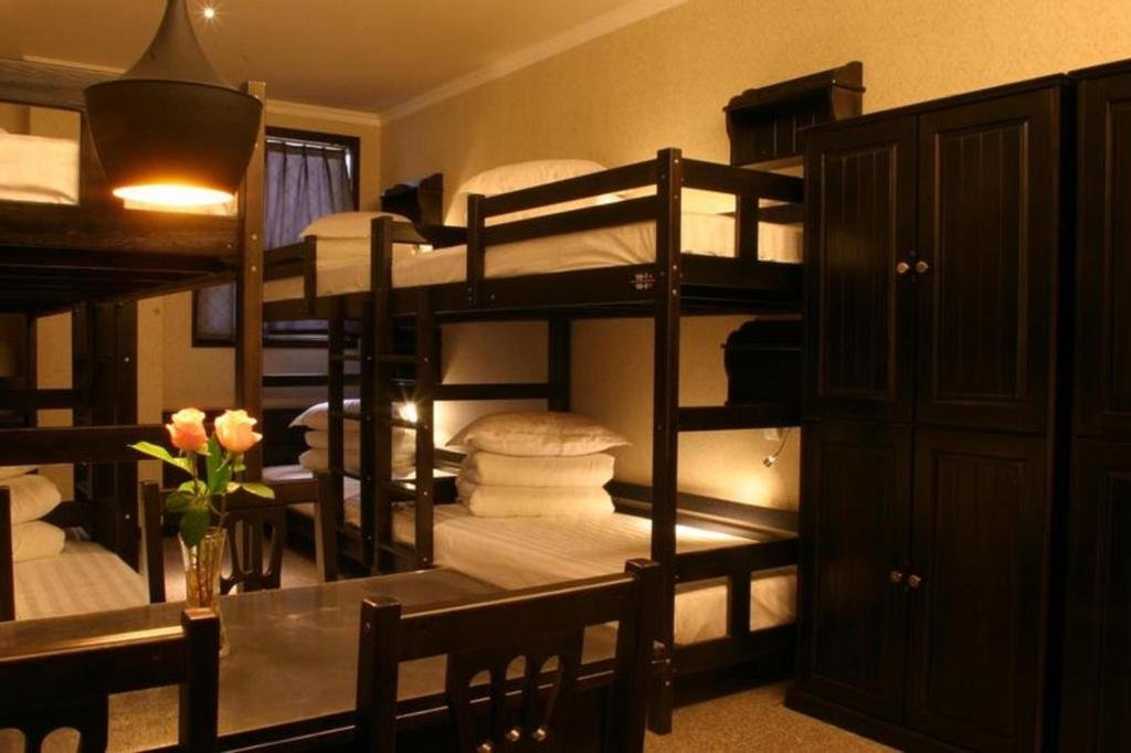 Кровать в общем номере Hantang Inn Hostel Xi'an