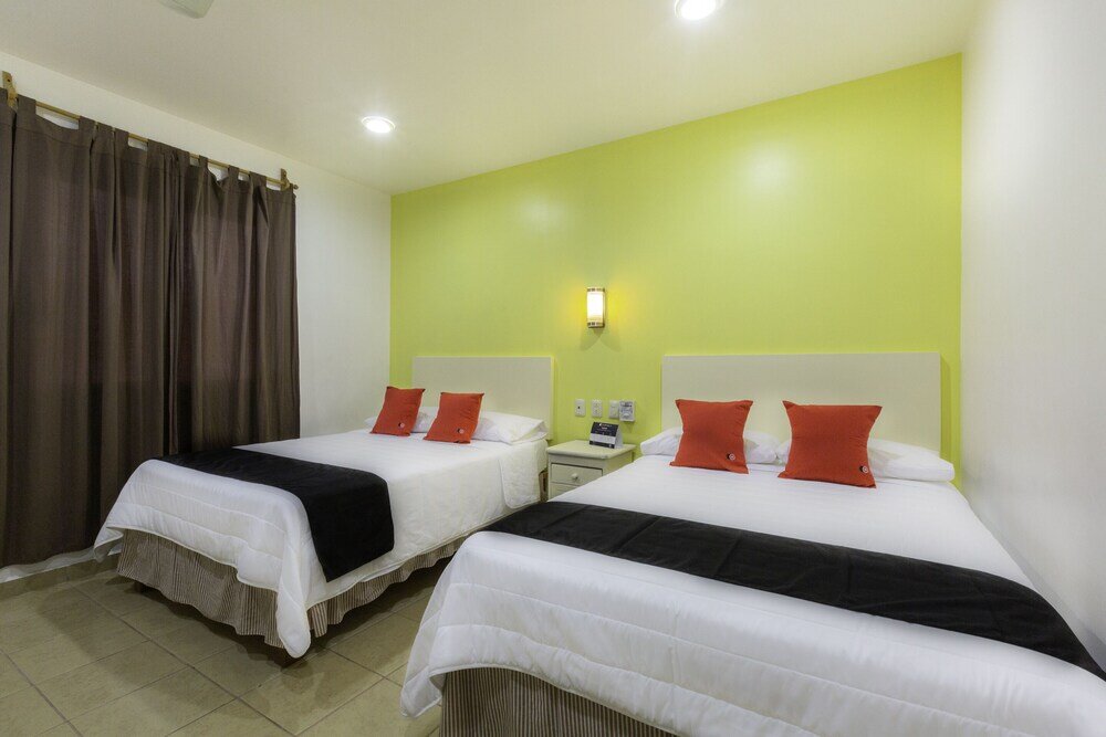 Четырёхместный номер Standard Capital O Oaxaca Guest Hotel