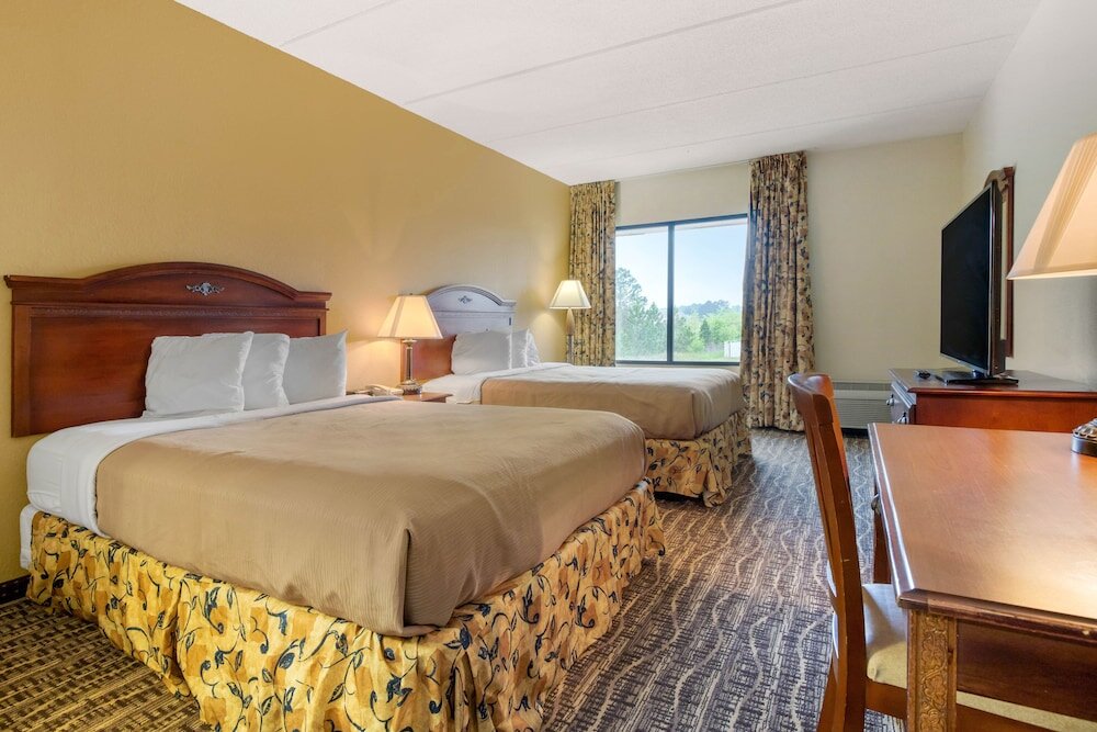 Standard Quadruple room LikeHome Extended Stay Hotel Warner Robins