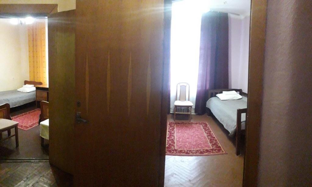 Кровать в общем номере Kolos Hotel Obolon