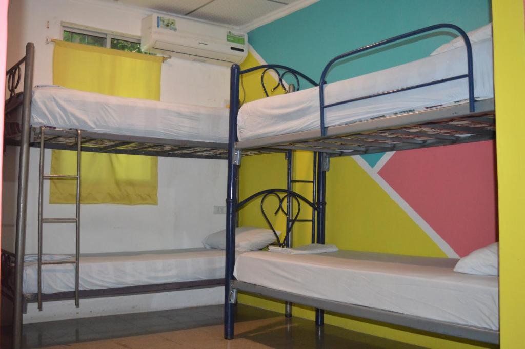 Кровать в общем номере Casa Michael