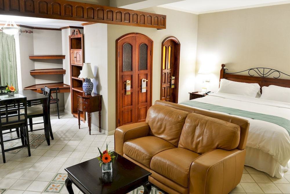 Кровать в общем номере Hotel Arcos del Parque
