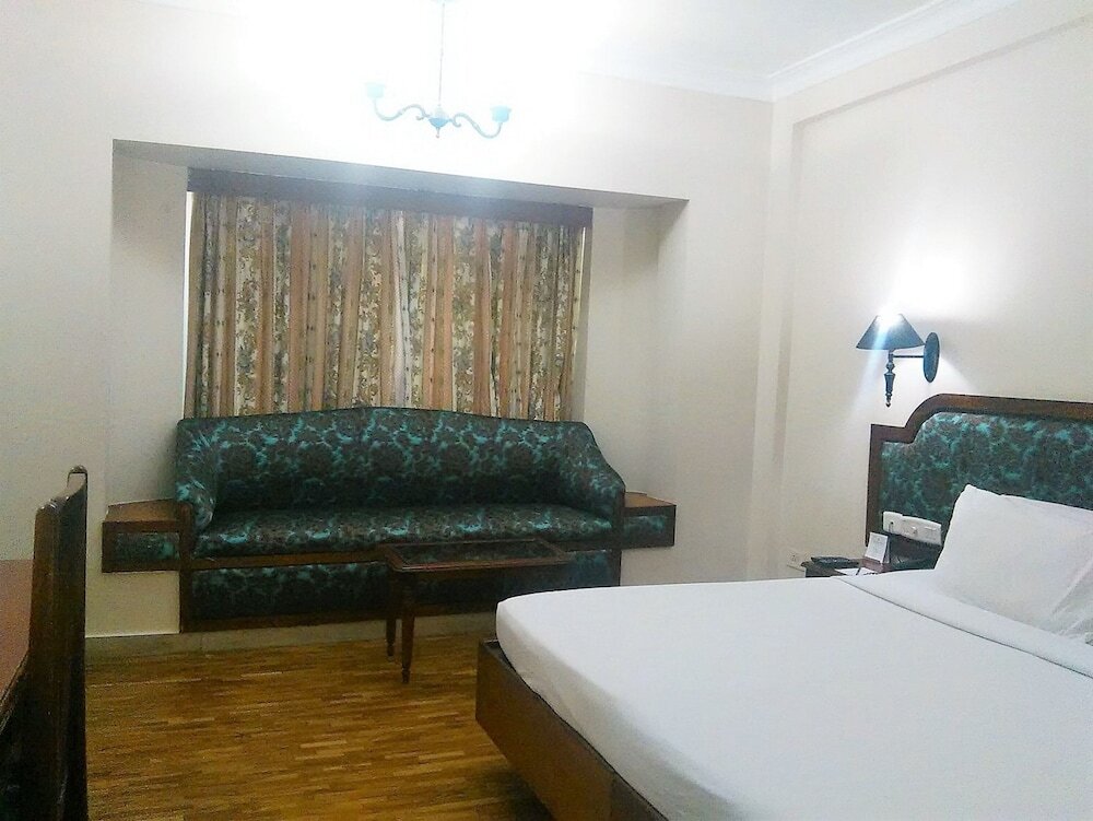 Deluxe room The Woods Manor MG Road