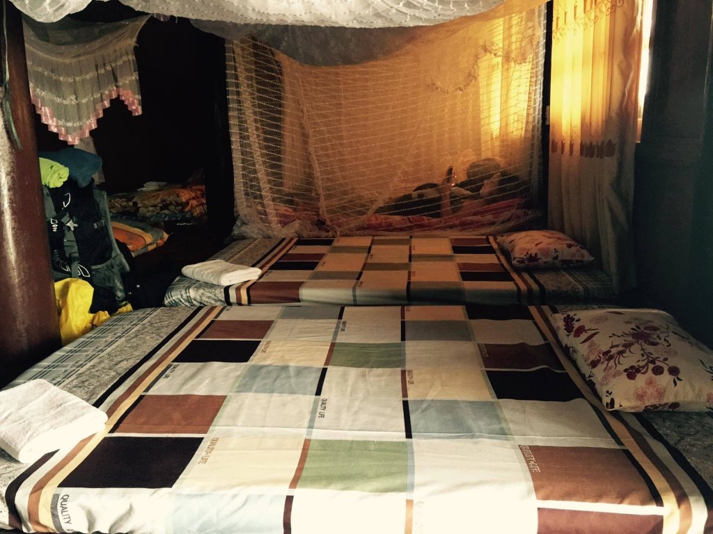 Cama en dormitorio compartido Stunning Homestay