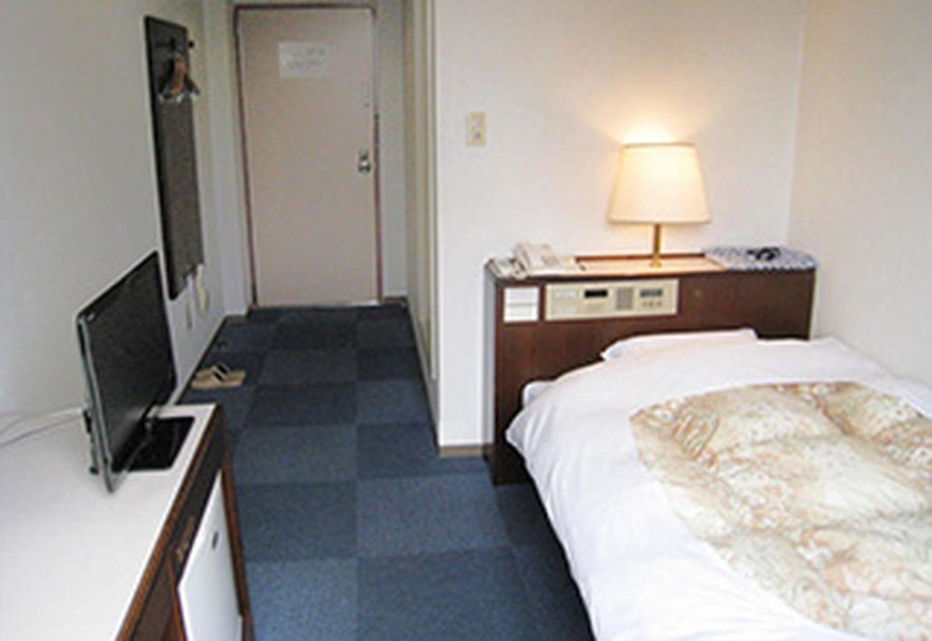 Bett im Wohnheim (Männerwohnheim) Hotel Higashihiroshima Hills Saijyo