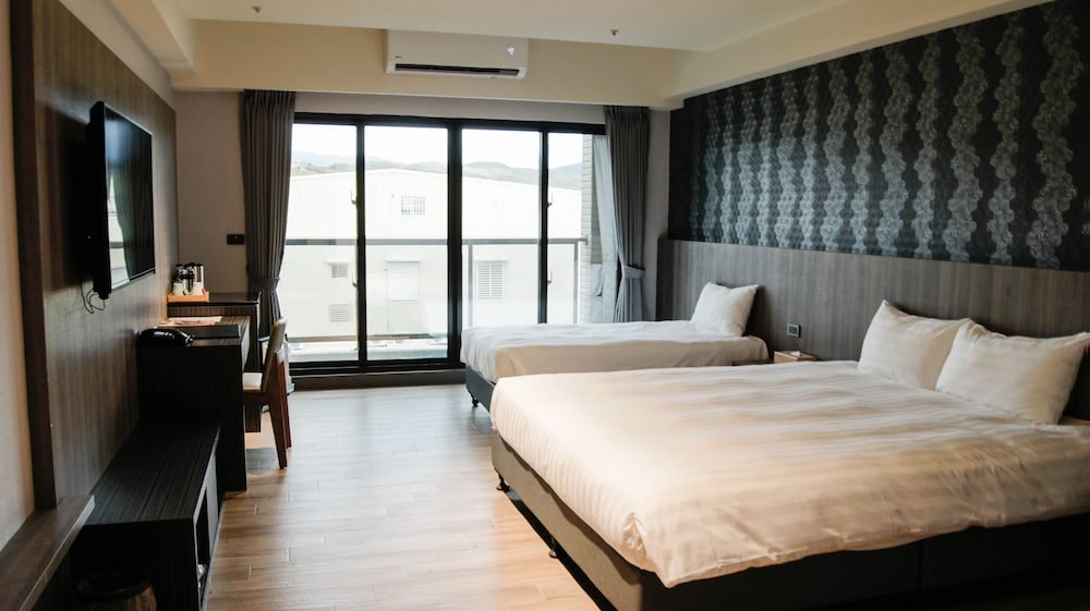 Standard Dreier Zimmer mit Balkon Kuei Ti Wan Hotel