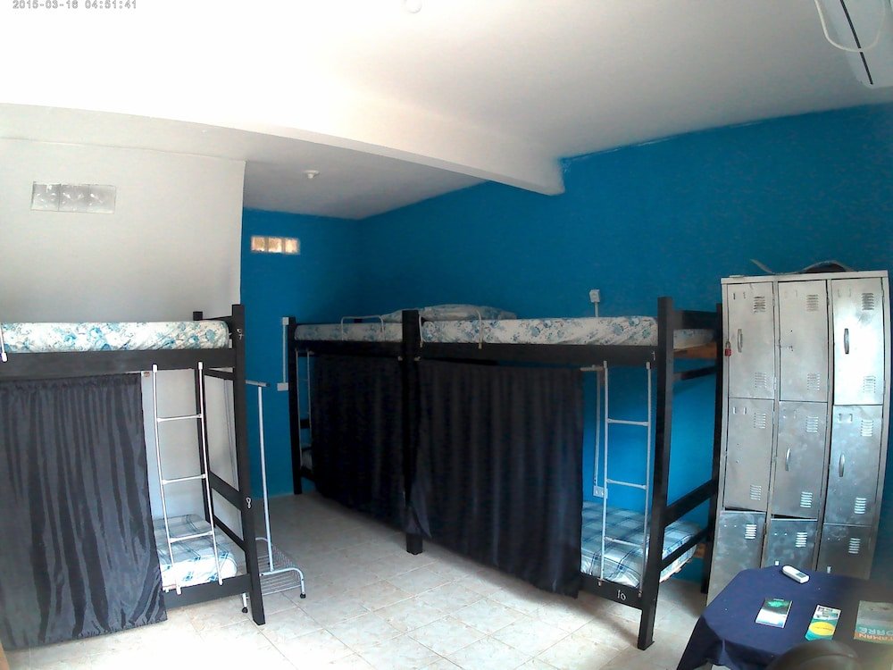 Кровать в общем номере Pousada Hostel81