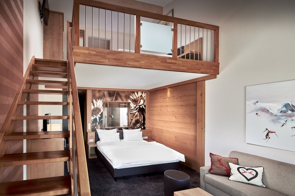 Confort quadruple chambre duplex Vue montagne Panoramahotel Oberjoch
