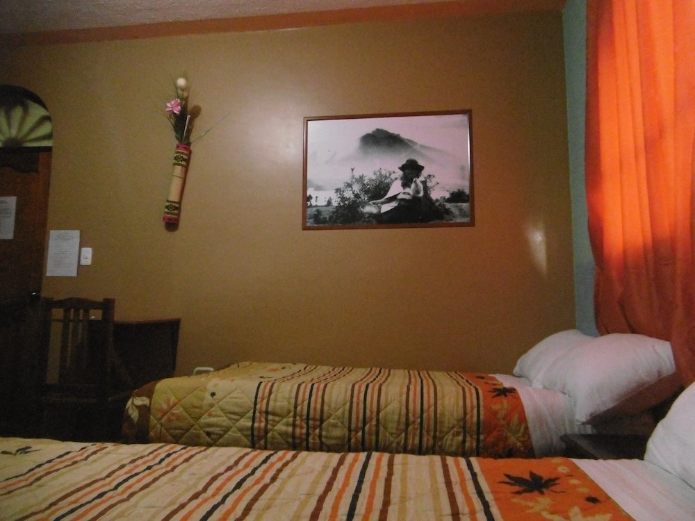 Четырёхместный номер Standard Hostal Otavalos Inn-Hostel