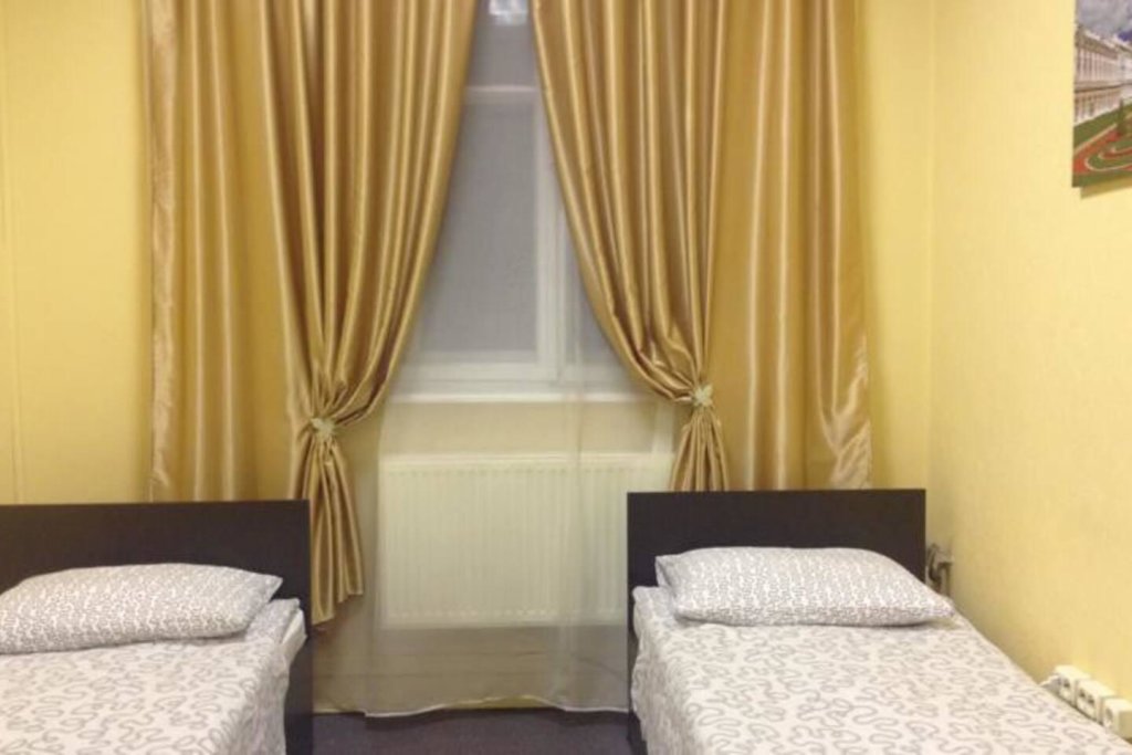 Кровать в общем номере Отель на Лиговском