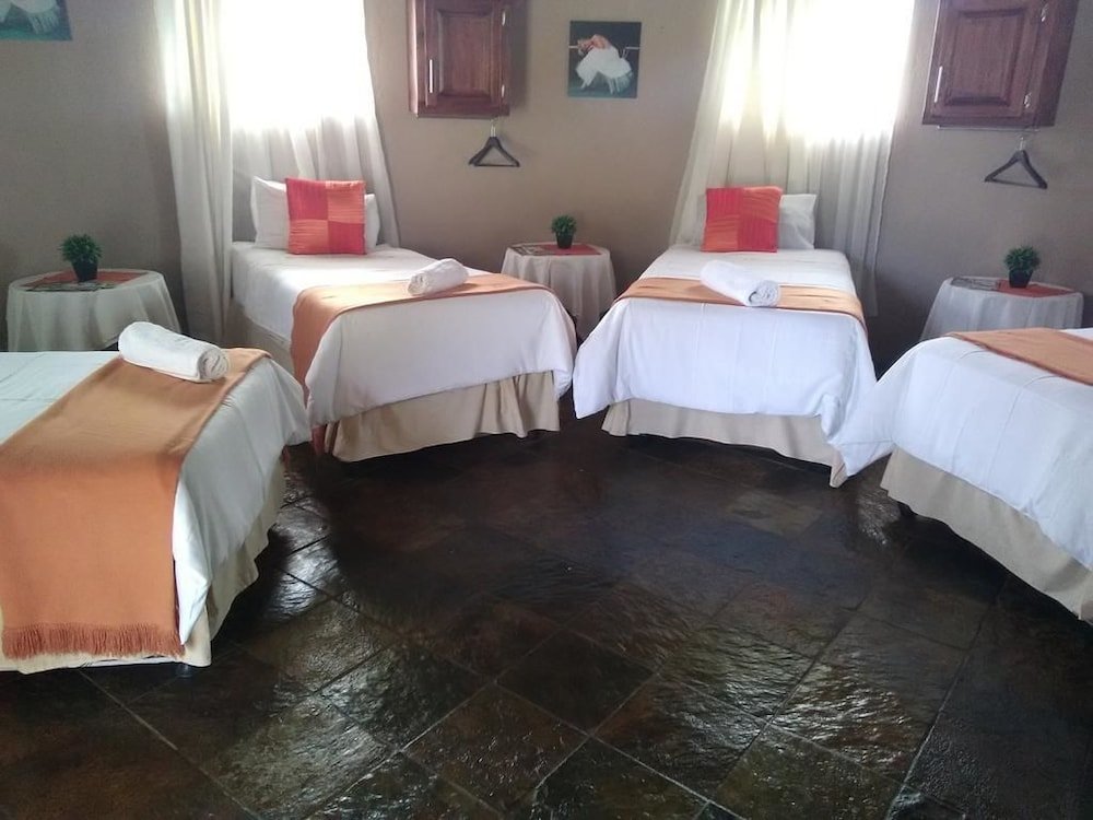 Кровать в общем номере Noma-Nini Lodge