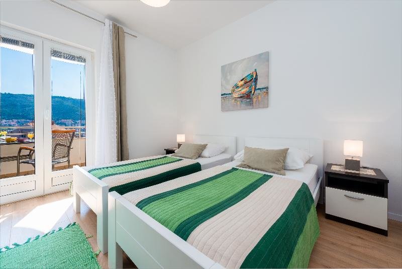 Апартаменты с 2 комнатами с балконом и с частичным видом на море Apartments My Dubrovnik
