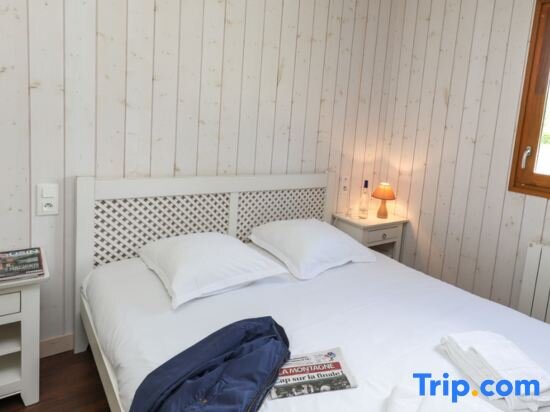 Cama en dormitorio compartido 2 dormitorios con vista al lago Vacancéole - Le Domaine des Monédières