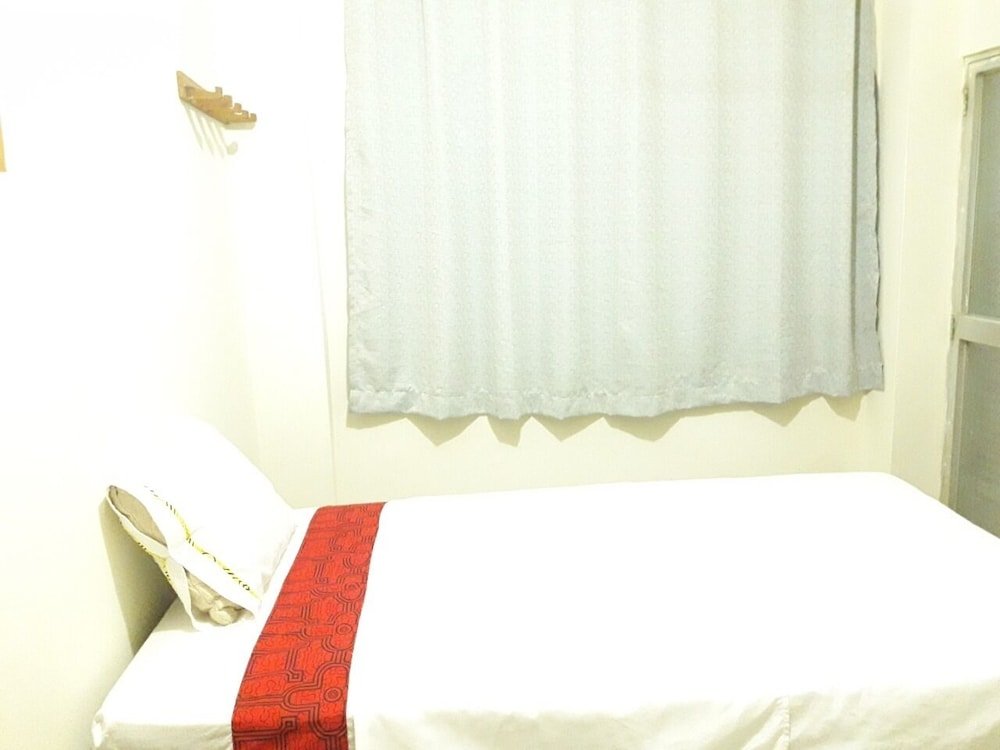 Cama en dormitorio compartido Ayaymama House