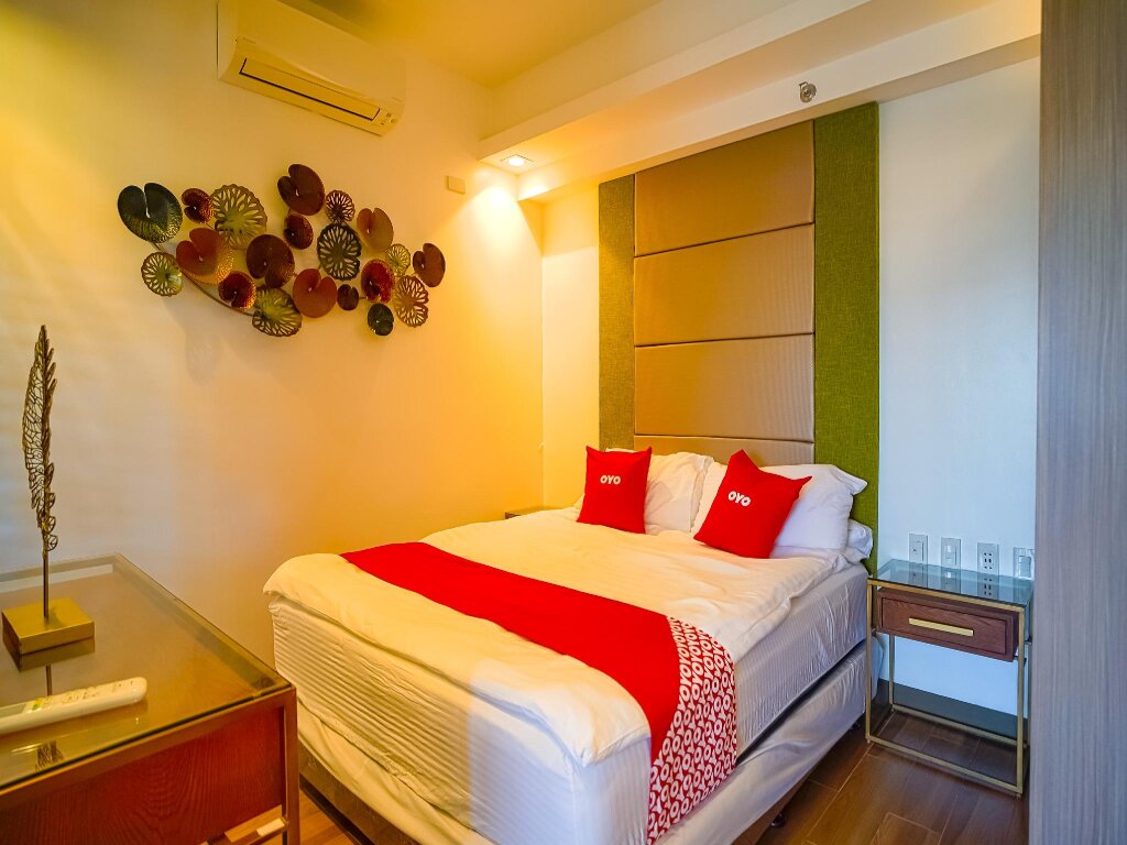 Suite OYO 785 The Greenhive Hotel