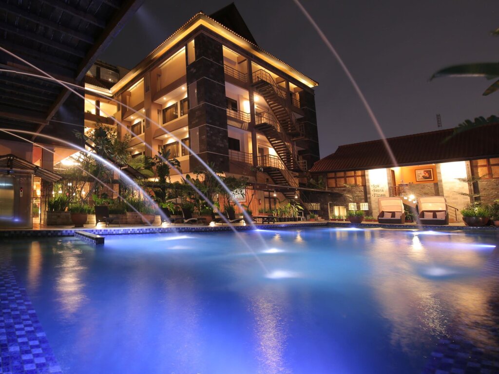 Cama en dormitorio compartido Bali World Hotel