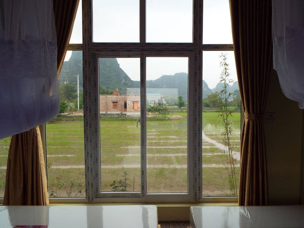 Standard famille chambre avec balcon Hang Mua Homestay - Hostel