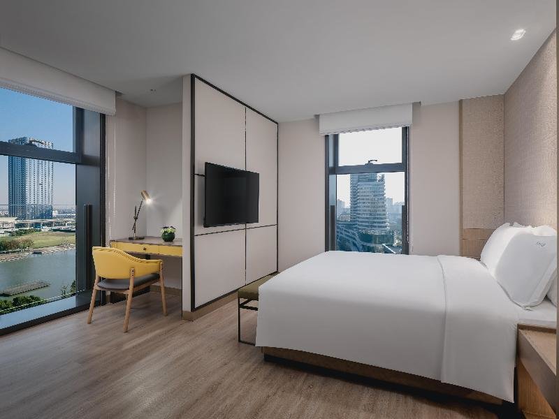Двухместный люкс c 1 комнатой Holiday Inn & Suites Kunshan Huaqiao, an IHG Hotel - F1 Racing Preferred Hotel