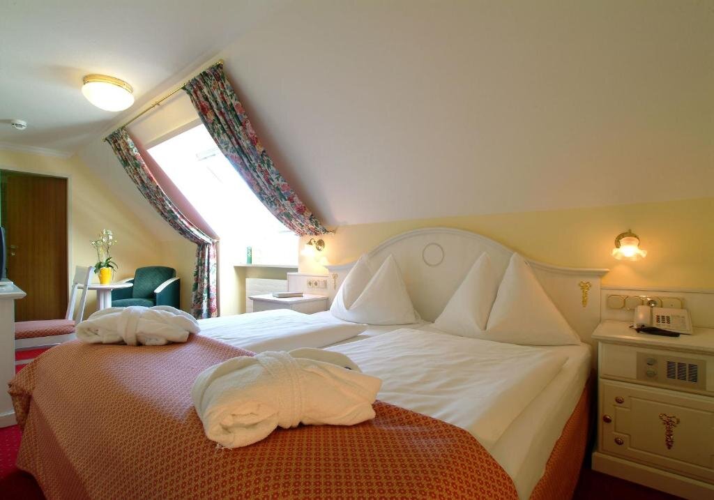Одноместный номер Standard Hotel Norica - Thermenhotels Gastein mit dem Bademantel direkt in die Therme