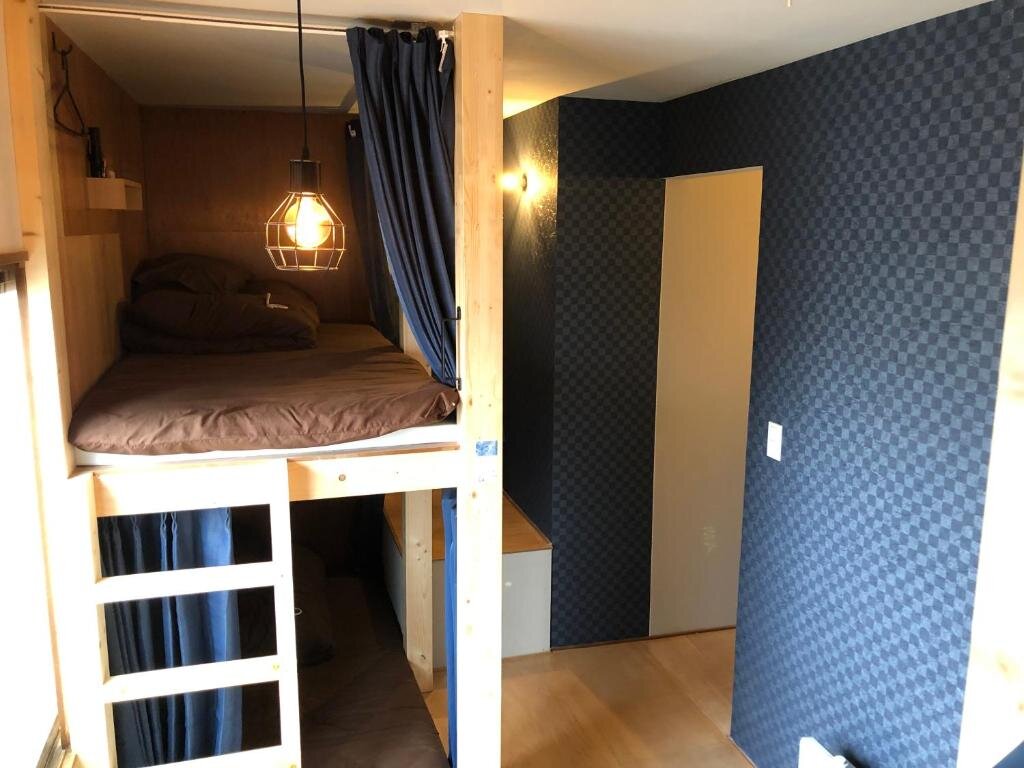 Кровать в общем номере (женский номер) Guesthouse OYADO SAPPORO