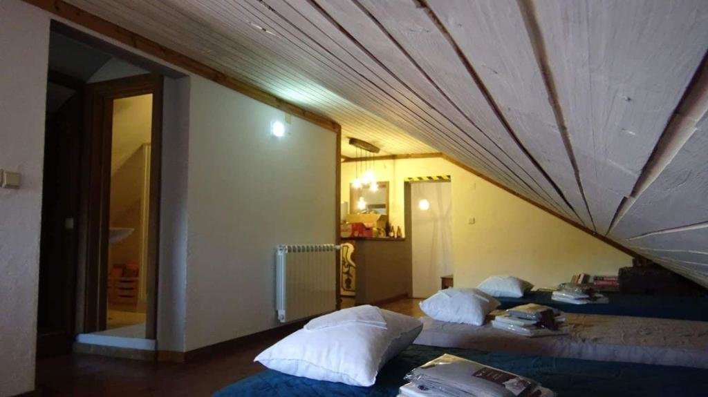 Кровать в общем номере Lago da Garça Guesthouse
