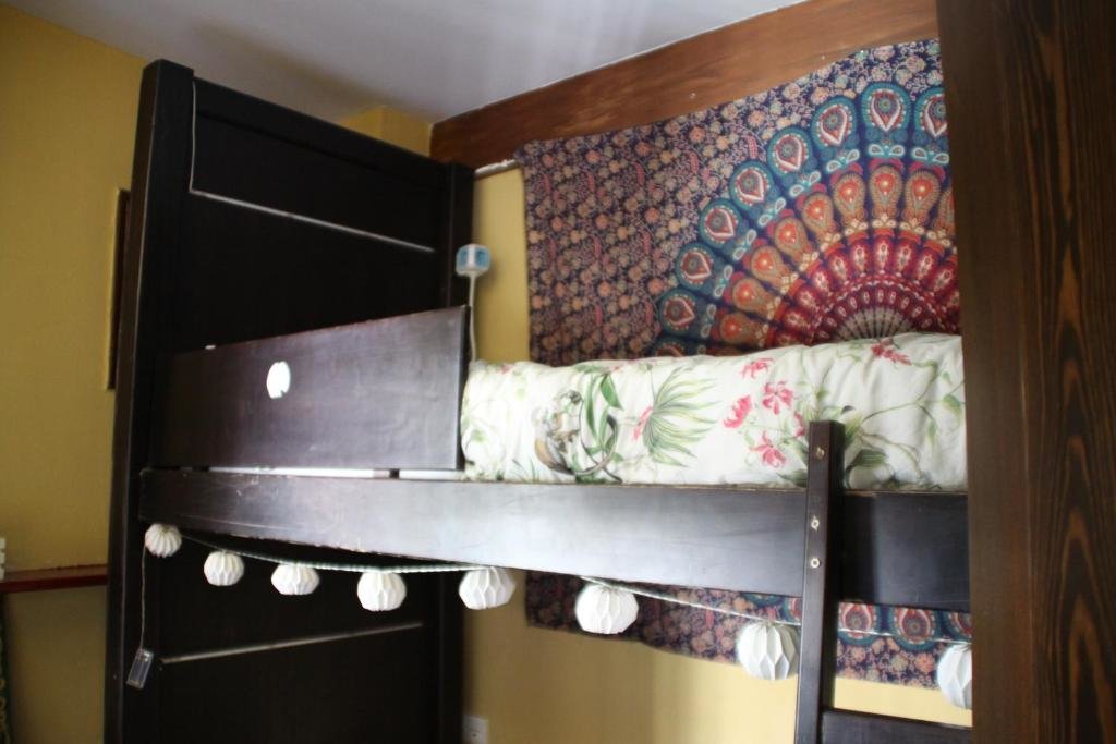 Кровать в общем номере Oripando Hostel
