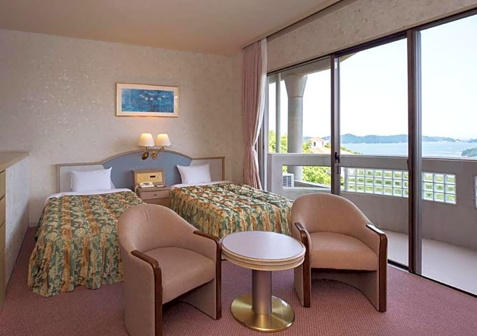 Standard quadruple chambre Izumigo Hotel Altia Toba