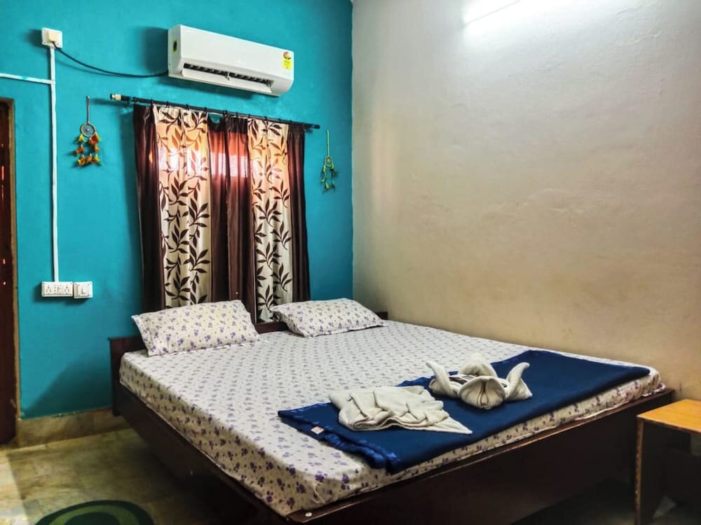 Deluxe double chambre avec balcon et Vue sur la ville Goroomgo Rukmini Villa Puri