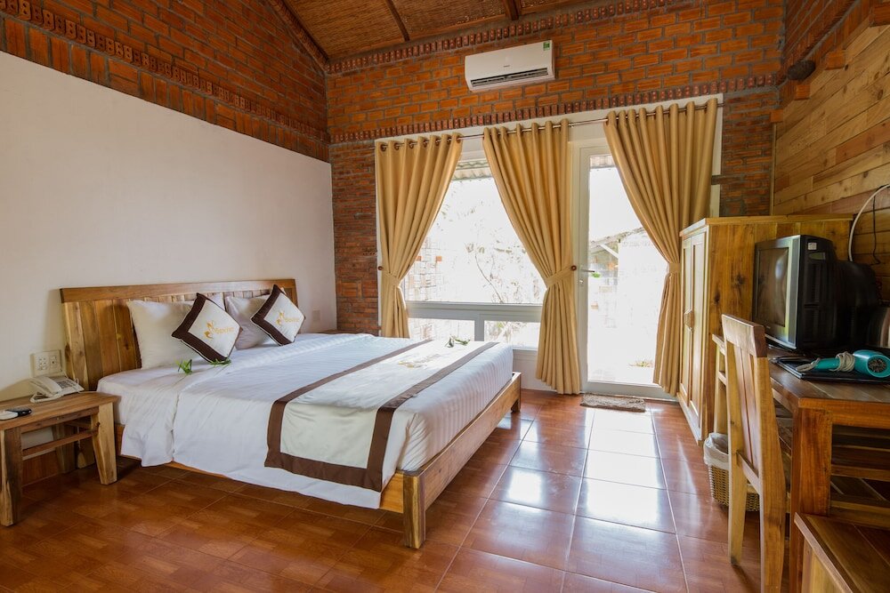Deluxe double chambre avec balcon et Avec vue Sen Viet Phu Quoc Resort, Sport & Spa