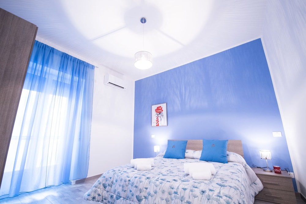 Confort triple chambre avec balcon Pantarei B&B