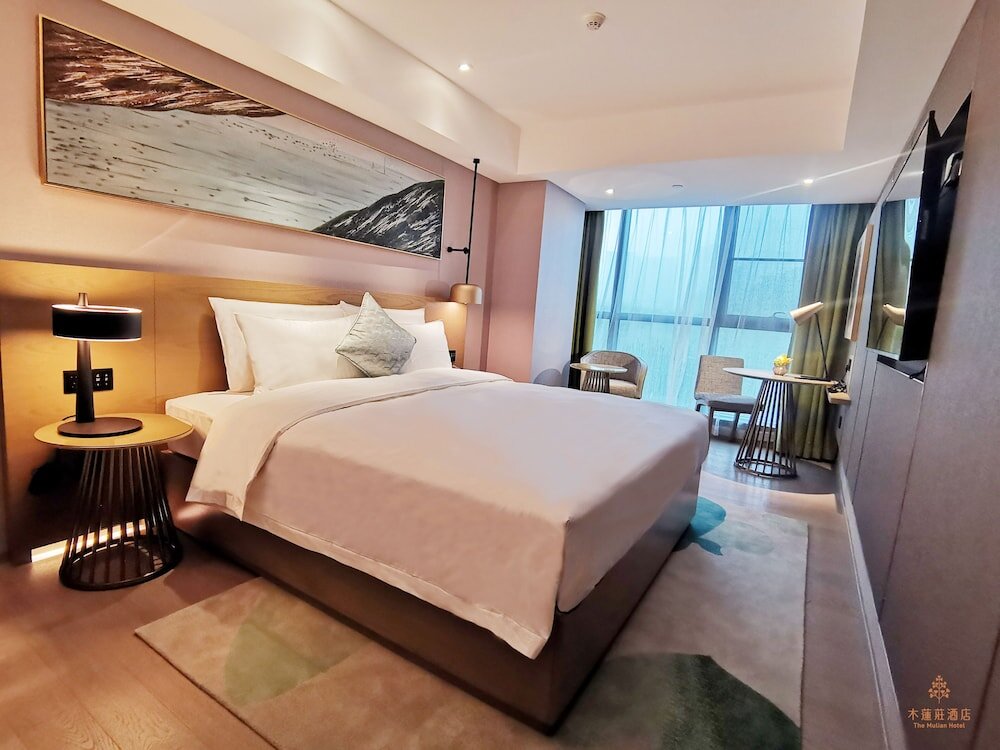 Deluxe room 广州高新国羽木莲庄酒店The Mulian Hotel Of Guangzhou Gaoxin Guoyu