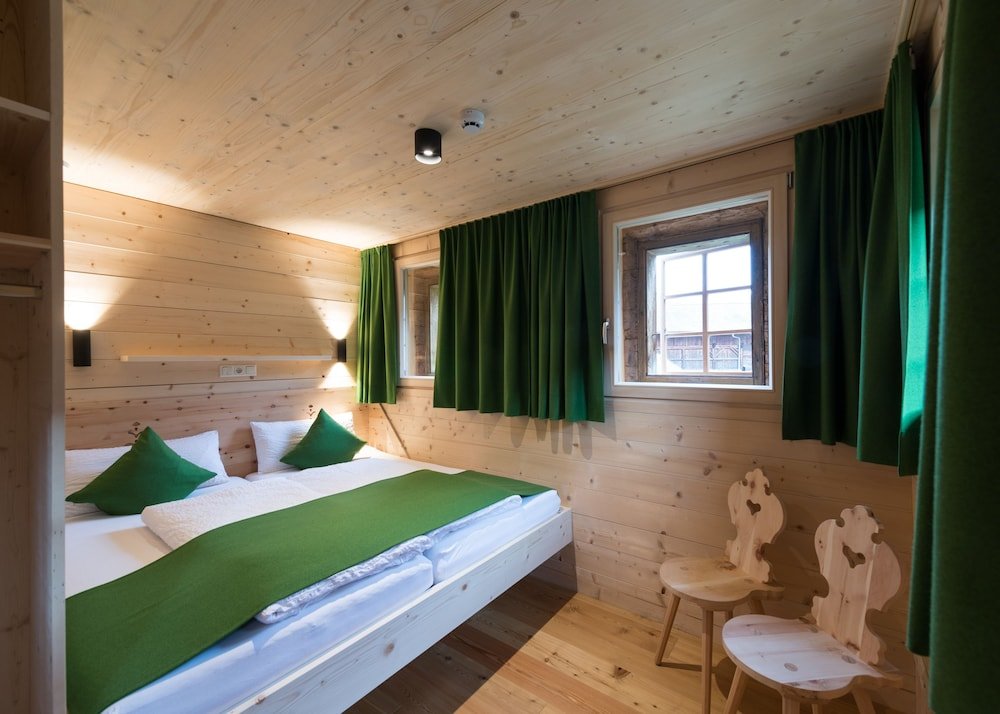 Apartment 2 Schlafzimmer mit Bergblick Ferienwohnungen am Berg - Giatla Haus