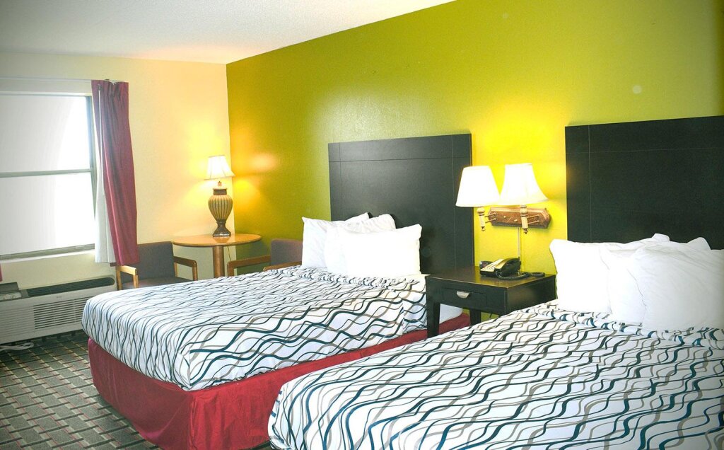 Cama en dormitorio compartido Sky Palace Inn & Suites Park City Wichita North