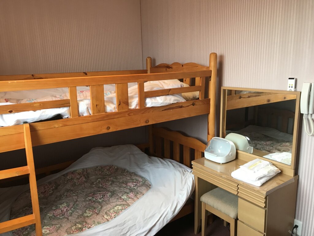 Кровать в общем номере Hotel Famitic Nikko Station
