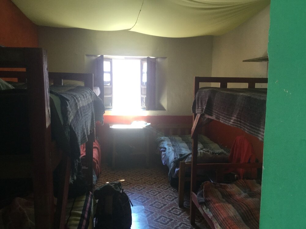 Кровать в общем номере Hostal Posada Mi Casa