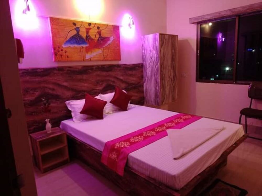 Deluxe room Utsav Grand by ShriGo Hotels