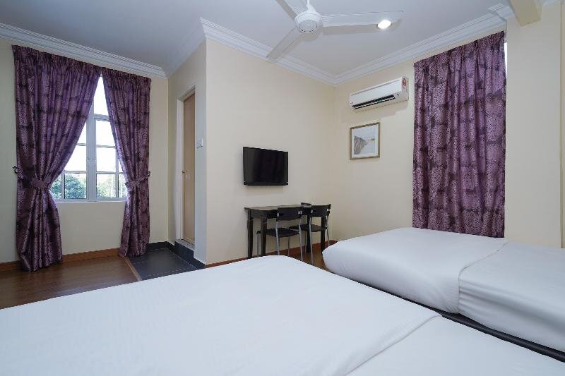 Четырёхместный люкс Super OYO 90009 Bangi Sri Minang Guesthouse