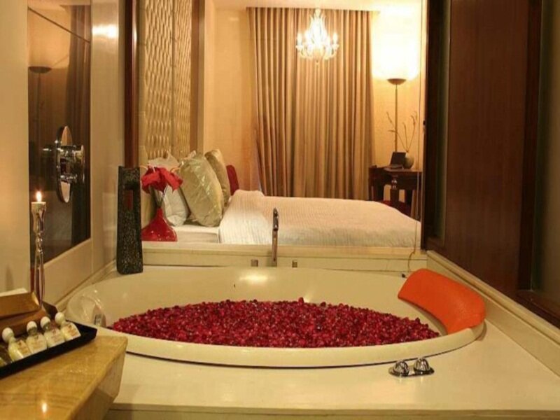 Кровать в общем номере Hotel Aura - New Delhi Railway Station