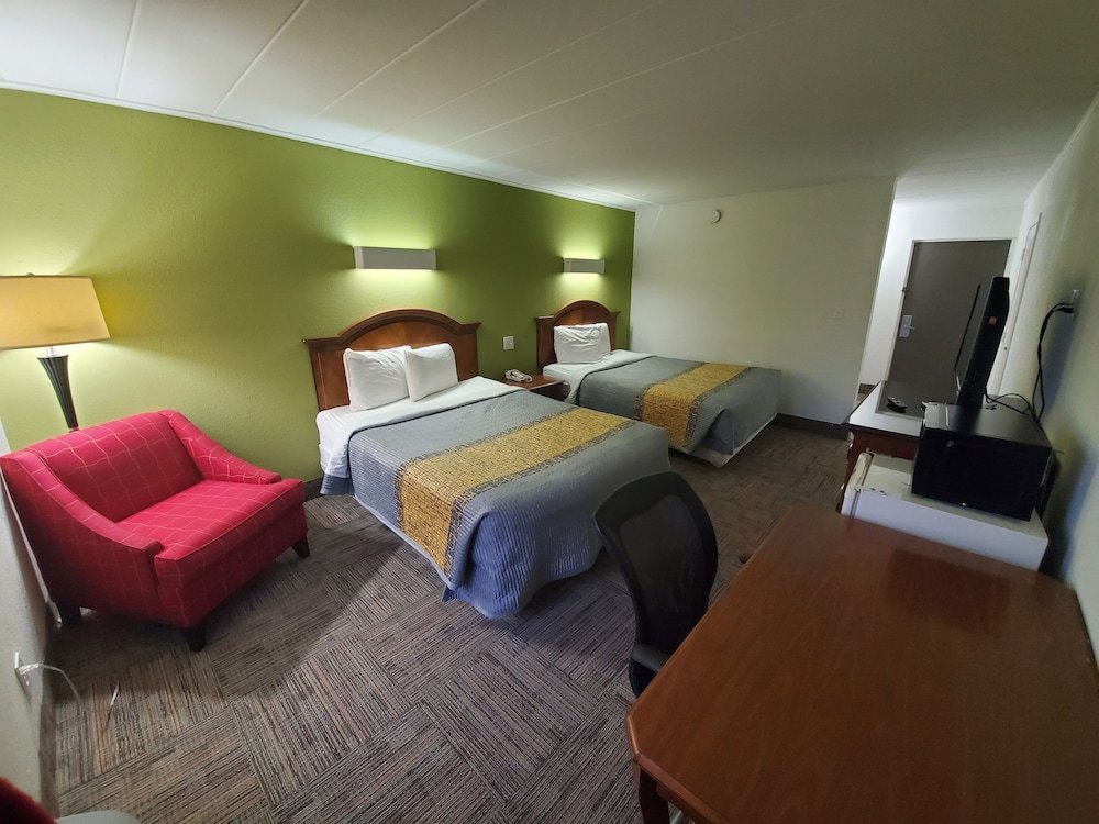 Standard quadruple chambre Royal Inn Hotel