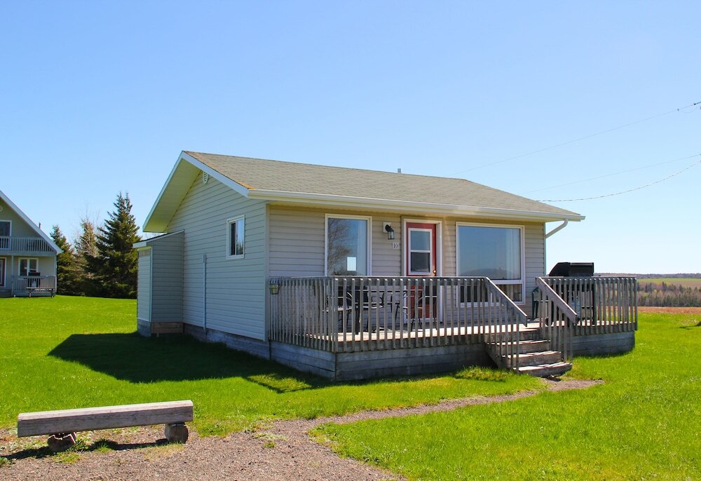 2 Bedrooms Standard Cottage with partial ocean view Swept Away Cottages