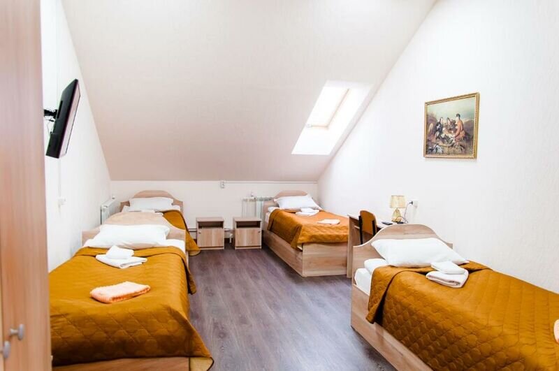 Кровать в общем номере Мини-отель Придорожный комплекс Лукоморье