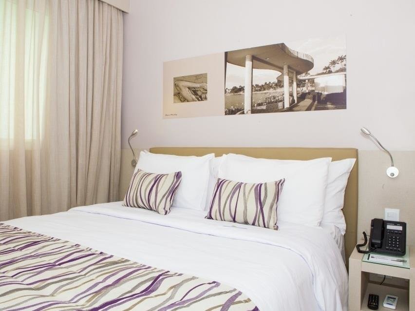 Кровать в общем номере CHA Pampulha Design Hotel
